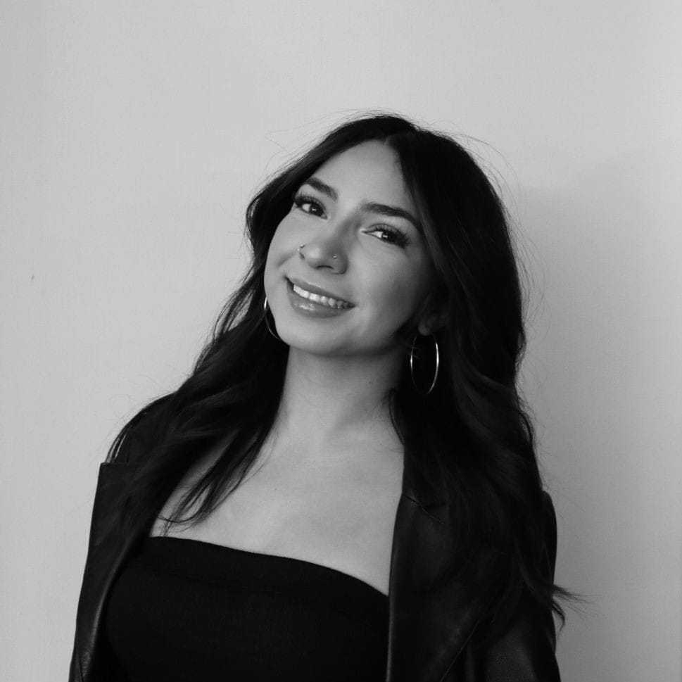 Portrait of Juliana, a professional stylist at Special FX Salon & Day Spa, showcasing their expertise and style.