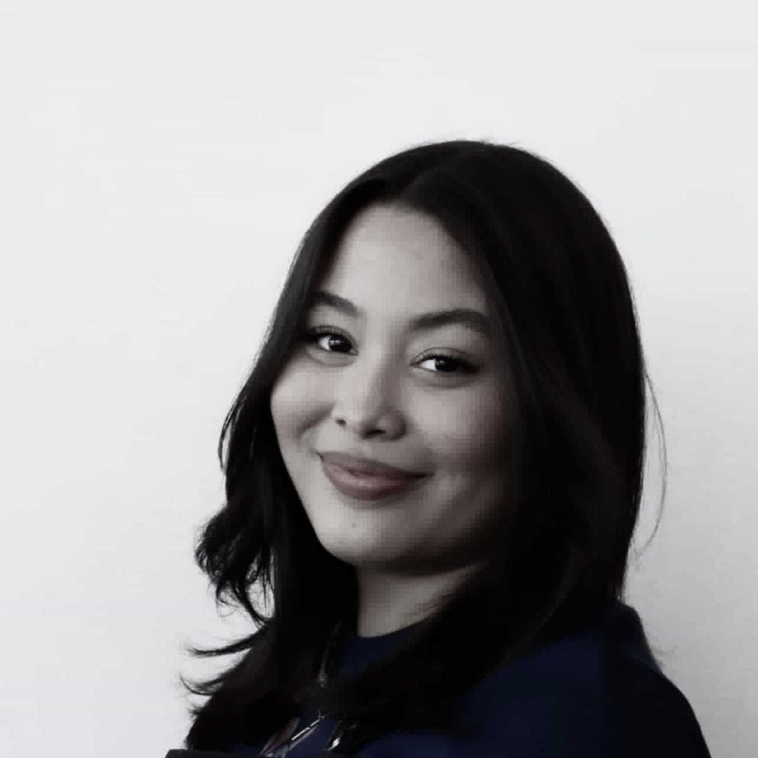 Portrait of Mia, a professional stylist at Special FX Salon & Day Spa, showcasing their expertise and style.